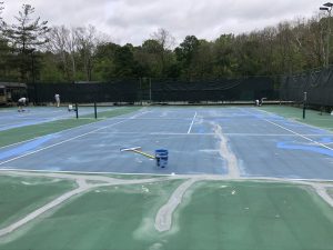 Tennis Courts being refurbished and painted