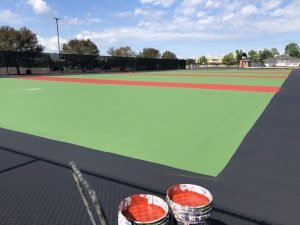 Lakota West Tennis Courts - Painting Red